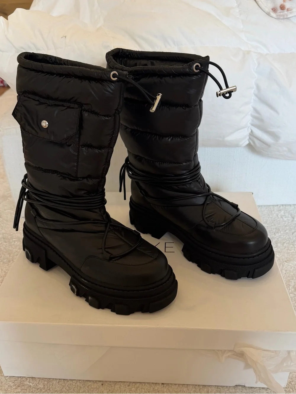 RAYE Black Quilted Puffer Winter Boots with Lug Sole
